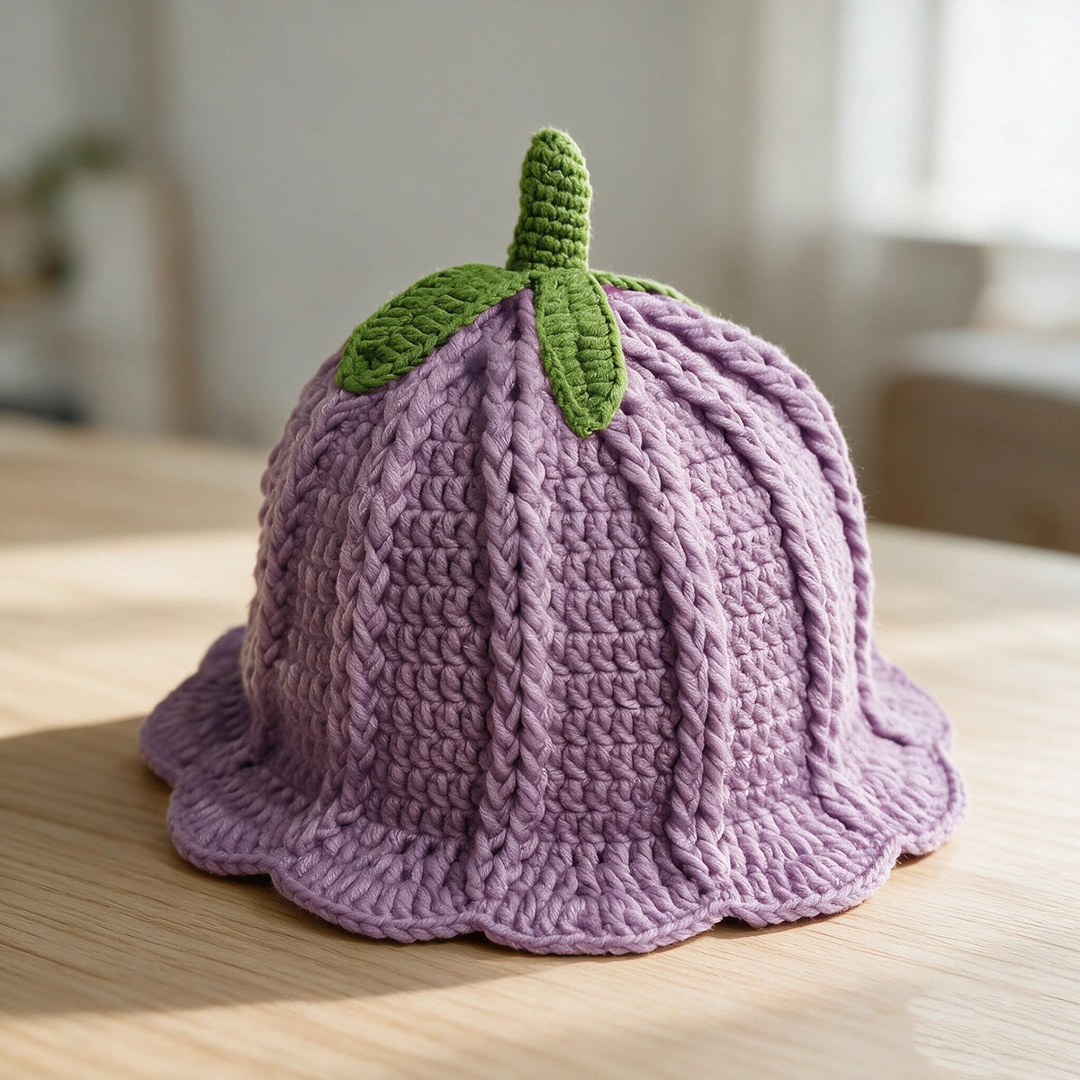 Knotwild hand-crocheted persimmon-colored ruffled bucket hat
