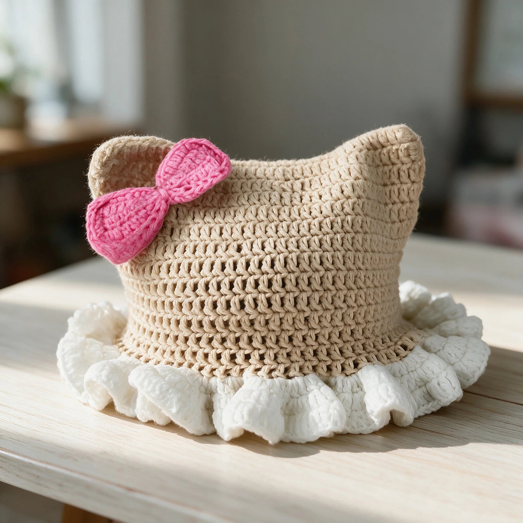 Knotwild crochet cat ear ruffle hat with pink bow for women