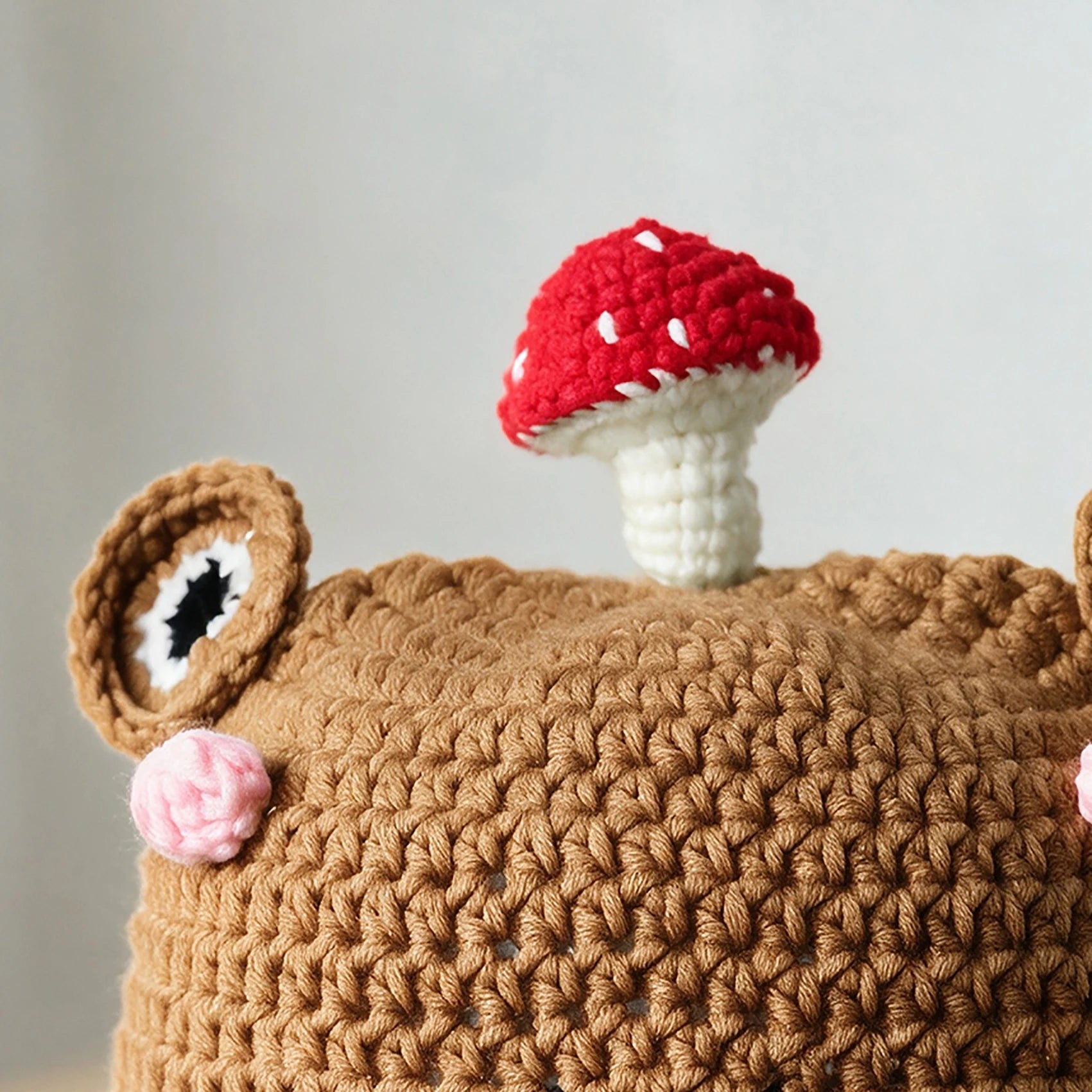 Knotwild hand-hooked crochet frog bucket hat with mushroom decor