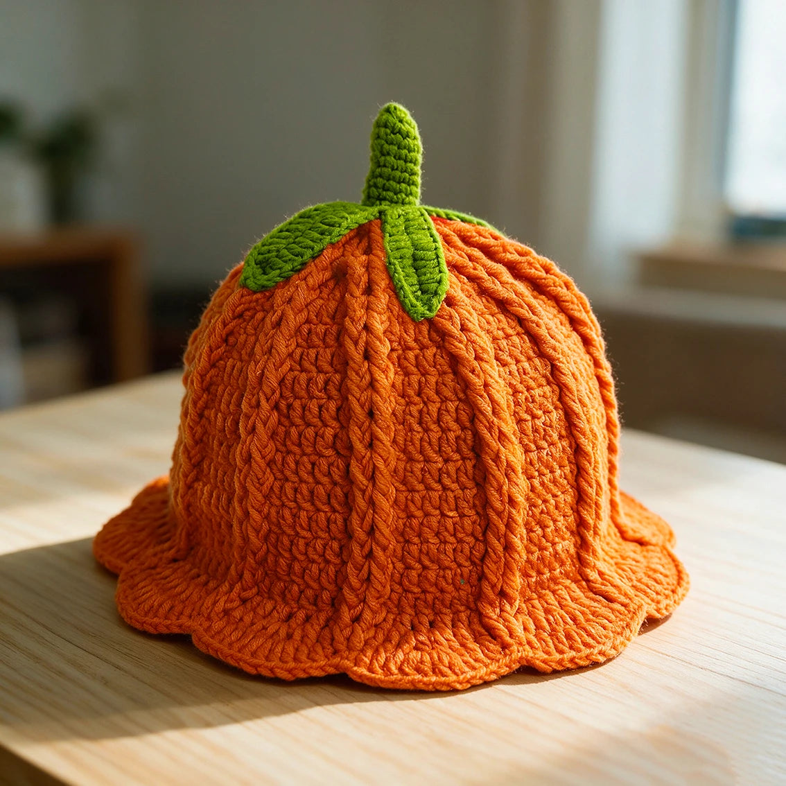 Knotwild hand-crocheted persimmon-colored ruffled bucket hat